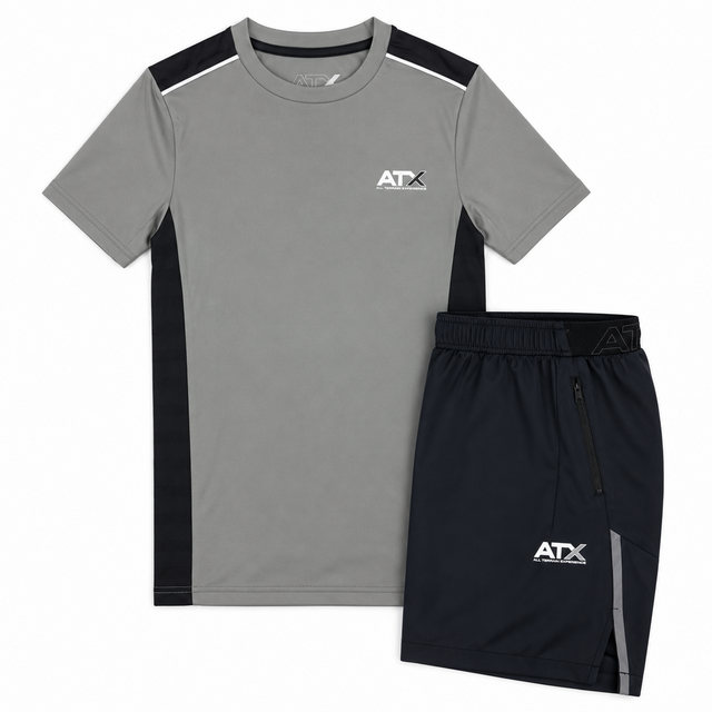 A two-piece athletic uniform set consisting of a gray short-sleeve t-shirt with black side panels and a black athletic shorts with a gray side stripe, both featuring a white 'ATX' logo. The set is displayed on a clean white background.