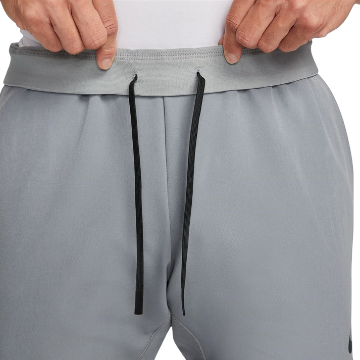 NIKE FLEX VENT PANTS - GREY