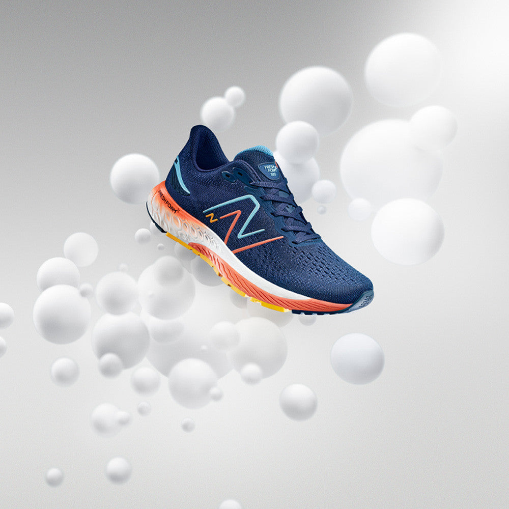 NEW BALANCE FRESH FOAM X 880V12 RUNNING TRAINERS - NAVY / APRICOT
