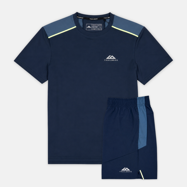 Navy athletic shirt and shorts set with visible brand logo on a light gray background