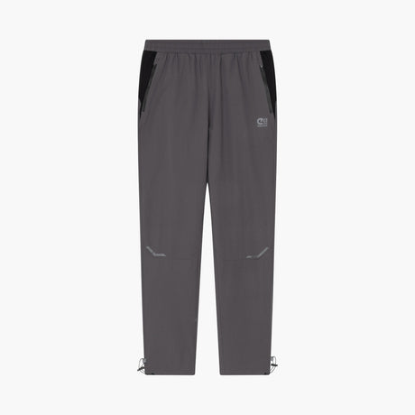 A pair of dark gray athletic pants with black side panels, a small white logo on the left thigh, and adjustable drawstring hems, shown against a plain white background.