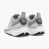 Gray and white sneakers with brand logo on a white background
