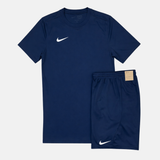 Navy blue athletic shirt and shorts set with Nike logo on a white background