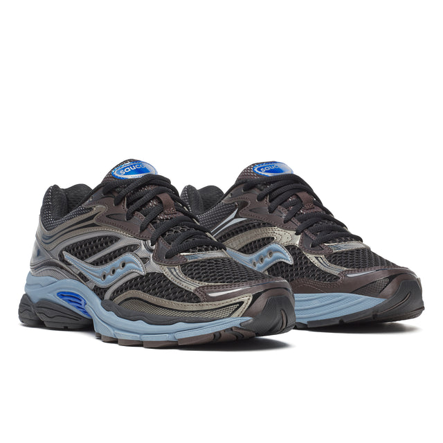 Pair of Saucony running shoes on a white background