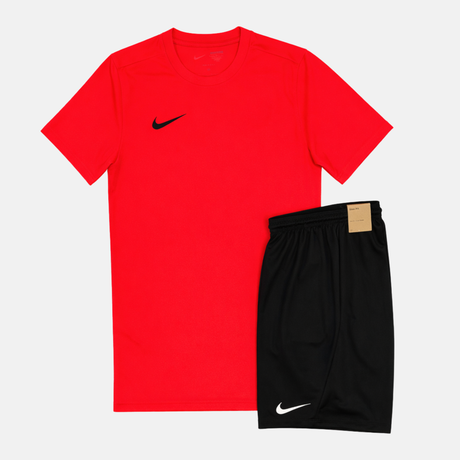 Red t-shirt with Nike logo and black shorts on a white background